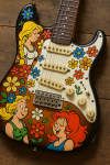 Photo réaliste d’une guitare électrique décorée façon Albert Uderzo